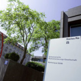 Swiss Re wider Erwarten mit Gewinn