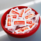 Adecco hält Schaden in Grenzen