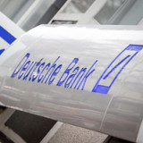 Fitch stuft Dutzende Banken herab