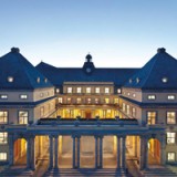 Gewinnrückgang von Münchener Rück geringer als befürchtet