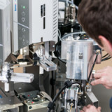 Komax wird mit Aufträgen überhäuft