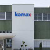 Komax erwartet Besserung
