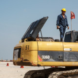 Caterpillar und Facebook unter Druck