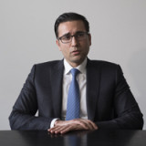 Credit Suisse und Iqbal Khan legen Rechtsstreit bei