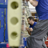 Schweizer PMI legt im Dezember leicht zu