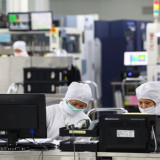 Chinas Industrie und Dienstleister wachsen