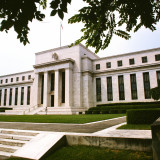 Fed signalisiert drei Zinsschritte 2022