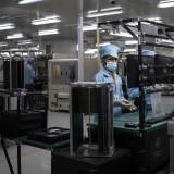 Chinas Industrie und Dienstleister wachsen wieder